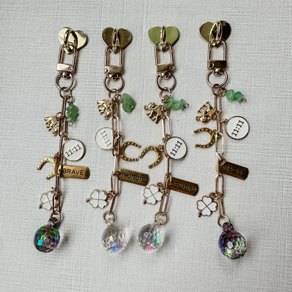 Manifest It E-reader Charm