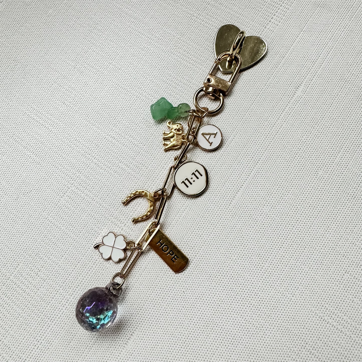 Manifest It E-reader Charm