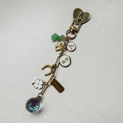 Manifest It E-reader Charm