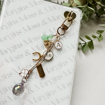 Manifest It E-reader Charm